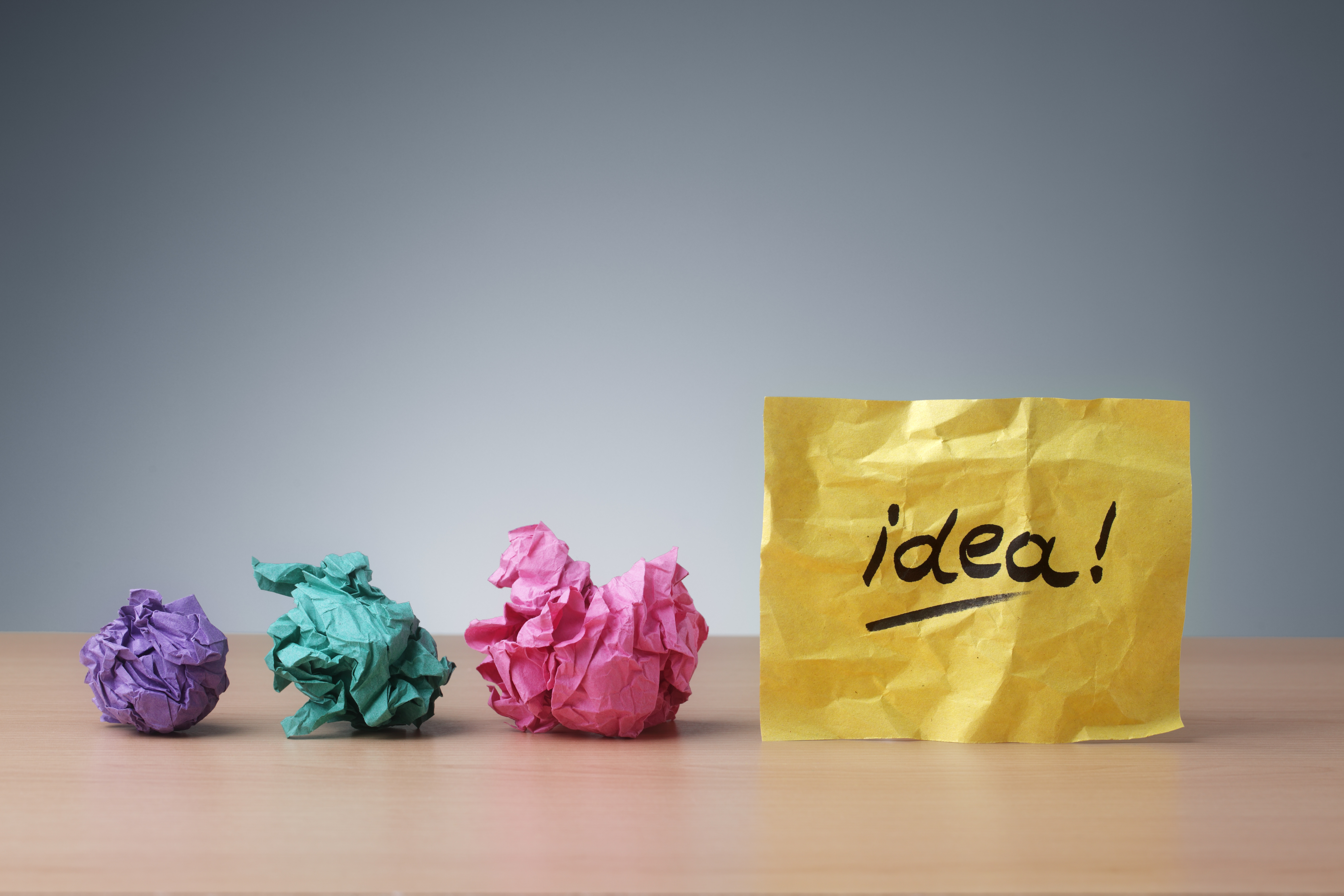 Evolving idea concept crumpled paper ball brainstorming for a good idea