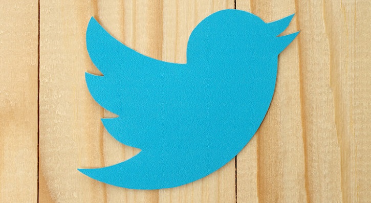 twitter logo on wood