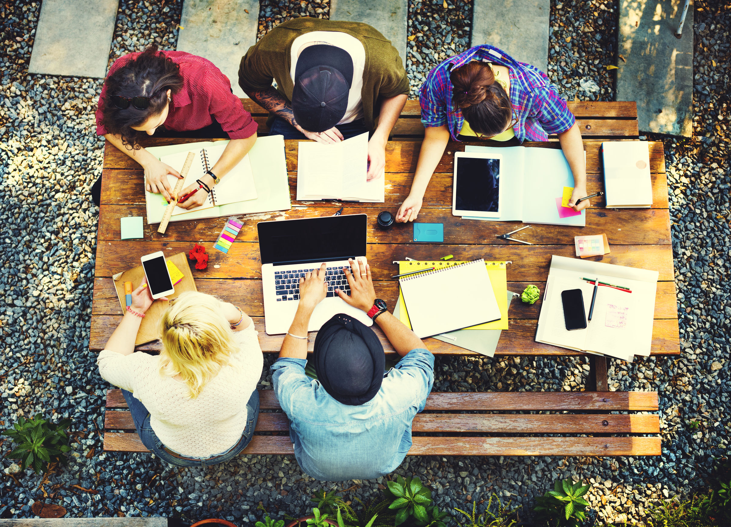 Students sitting around a table working